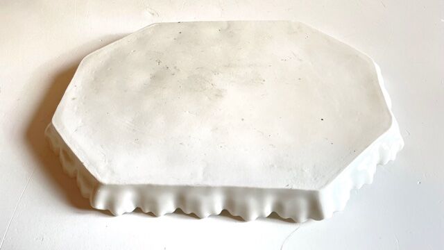 Old tray in floral pattern biscuit