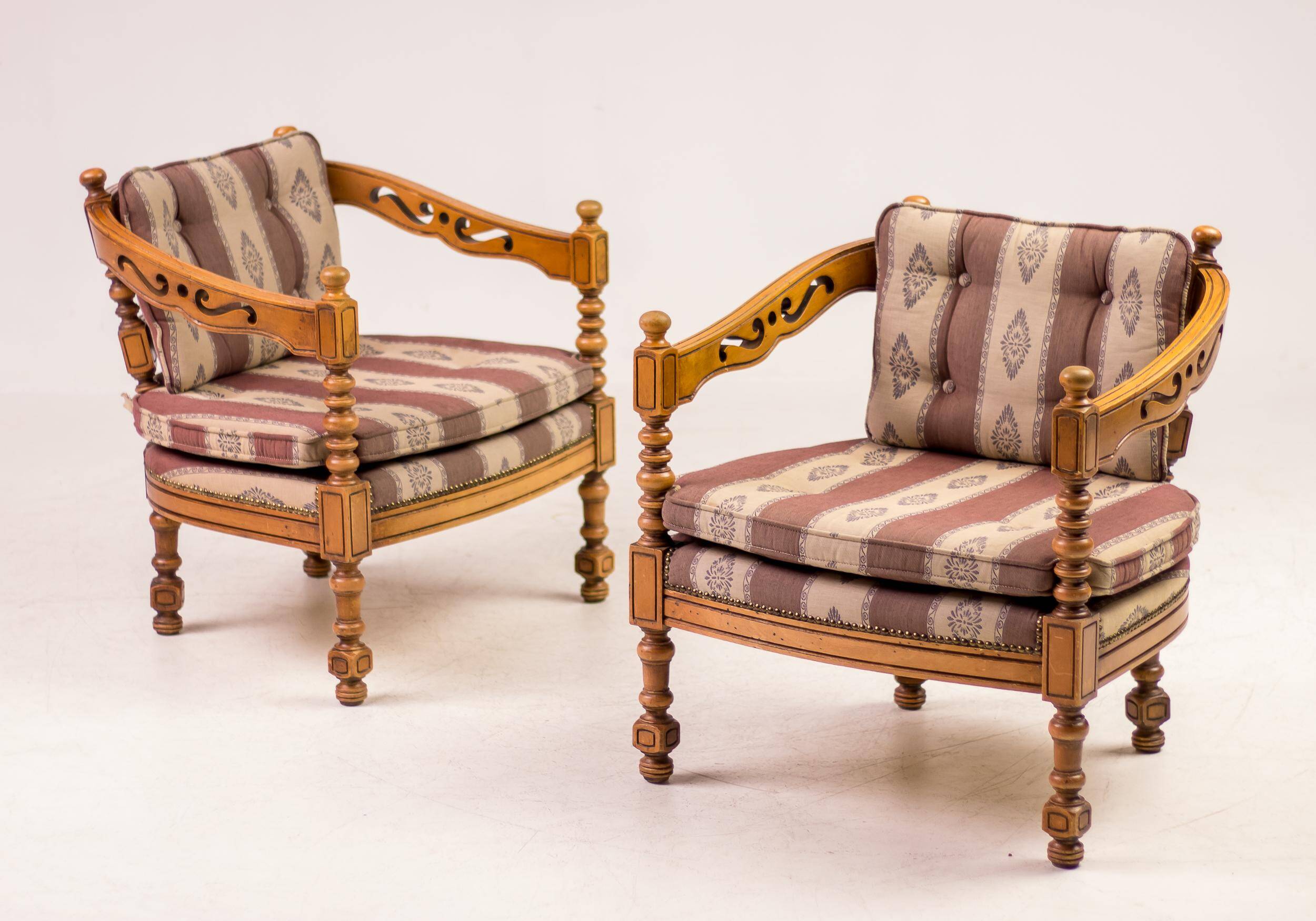 Pair of Giorgetti "1975 Gallery" armchairs in carved wood, original upholstery.
