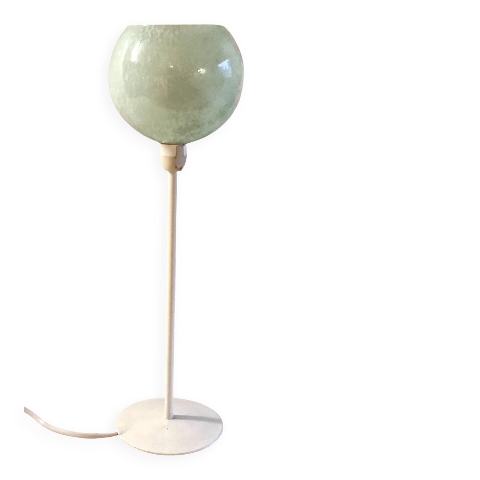 Table lamp with a pale green Clichy glass globe.