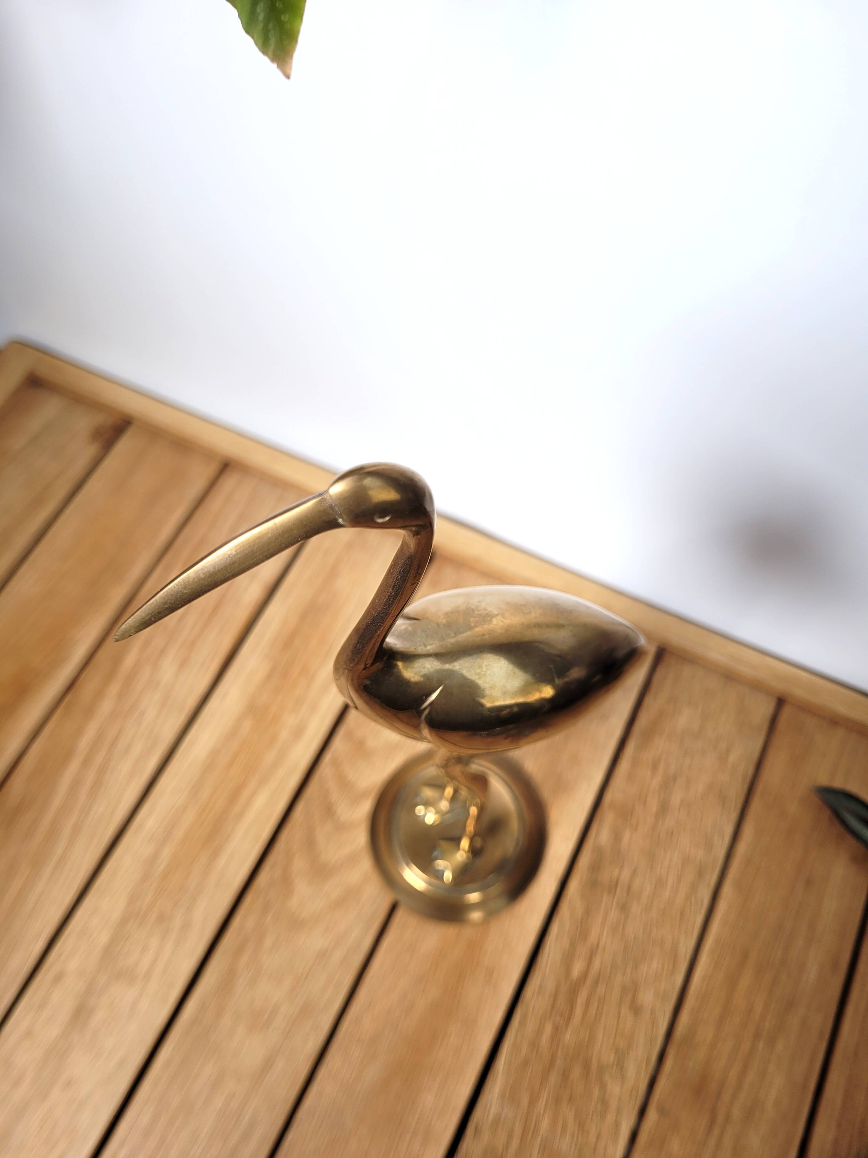 Golden brass blue heron