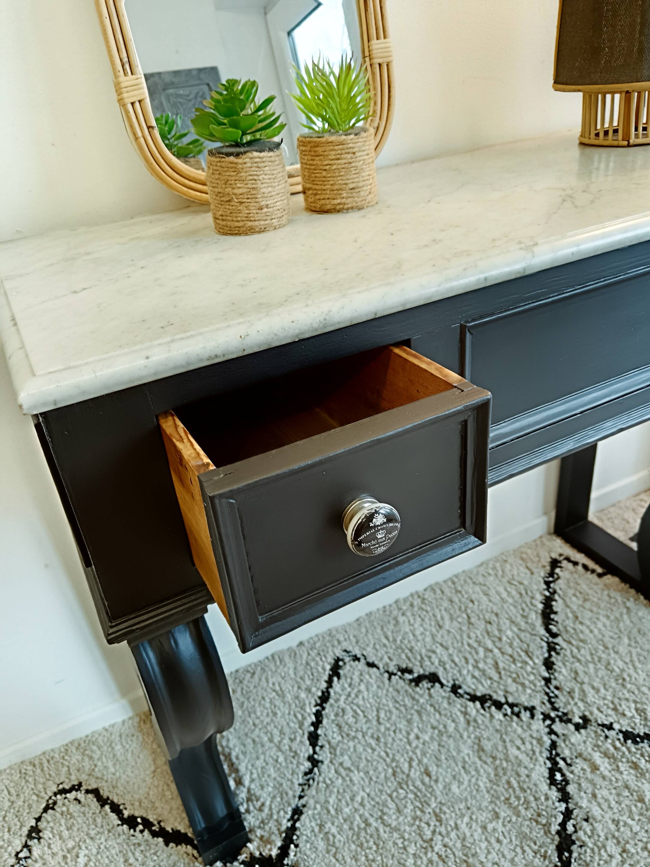 Black wooden dressing table with white marble top