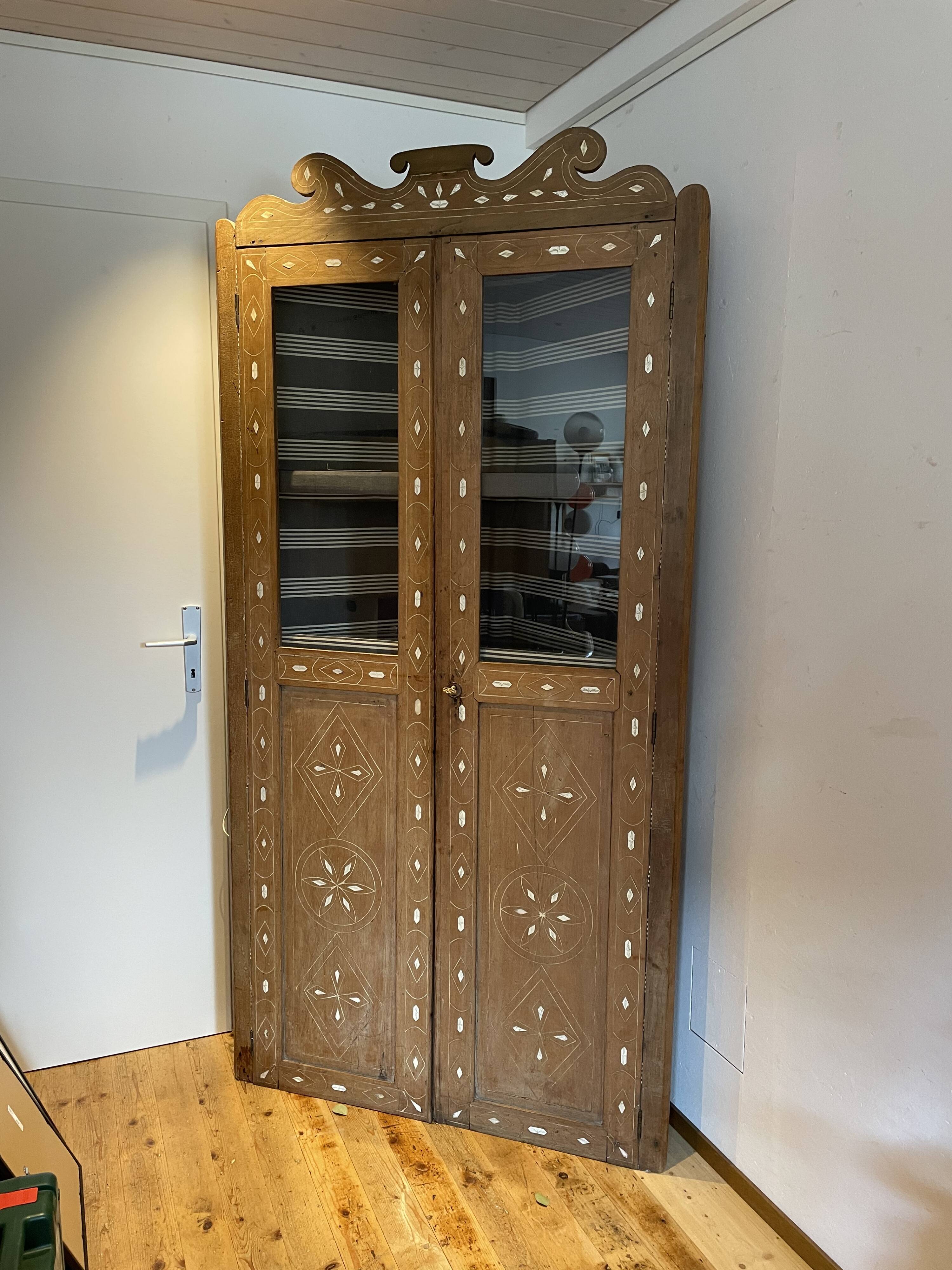 Oriental corner cabinet