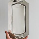 Shiny metal foie gras dish