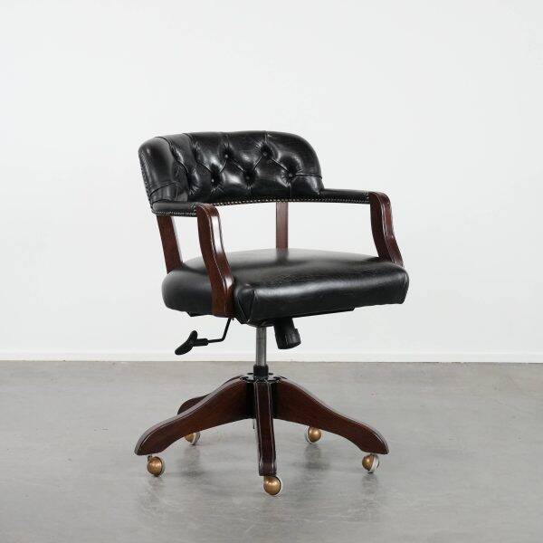 Adjustable black timeless Chesterfield office chair made of cow leather