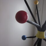 Vintage coat holder has 12 balls