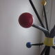 Vintage coat holder has 12 balls