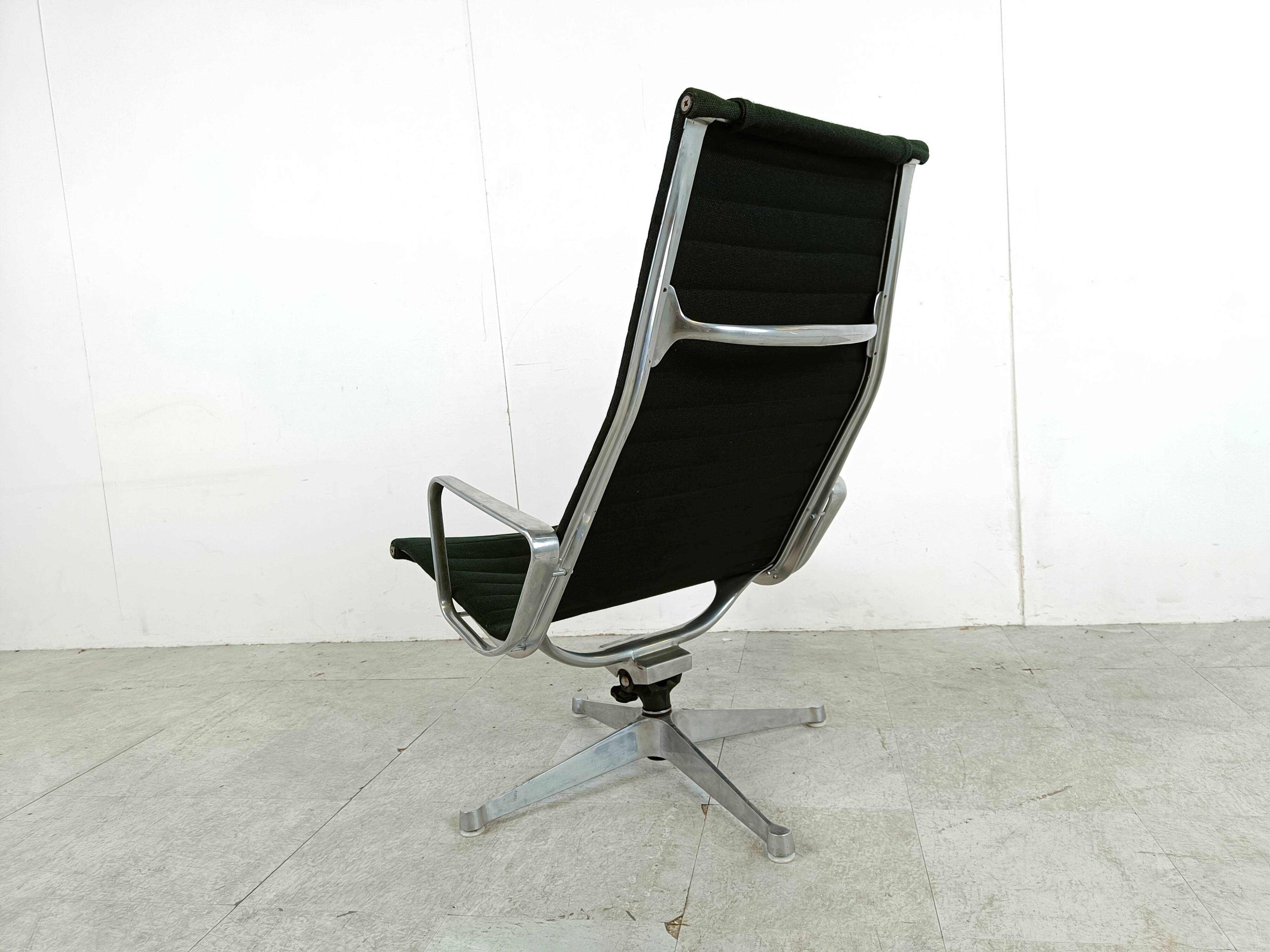 Charles & Ray Eames EA124 Lounge chair in black fabric, 1970s