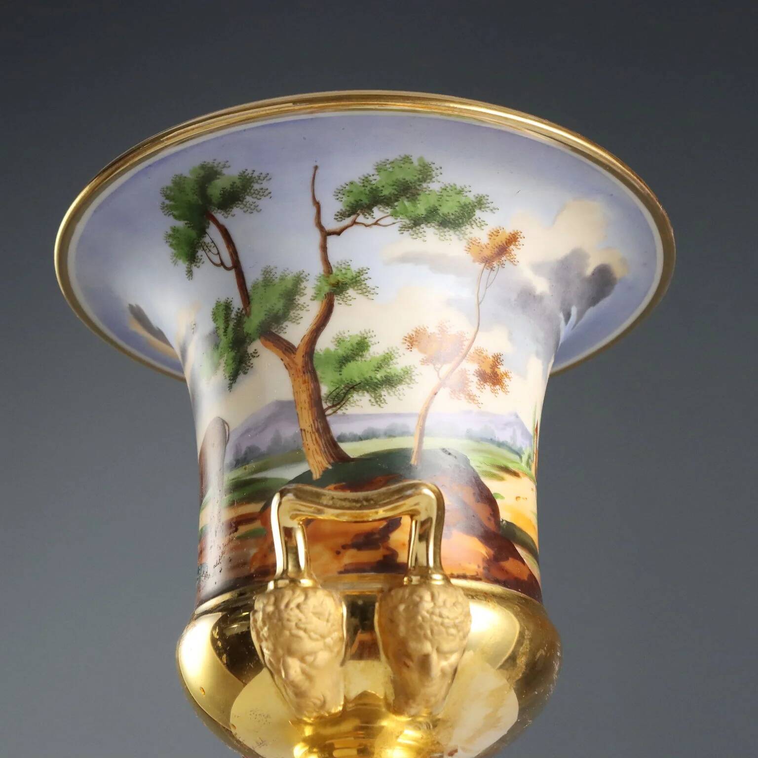 Pair of antique painted and decorated porcelain vases, France, 19th century.