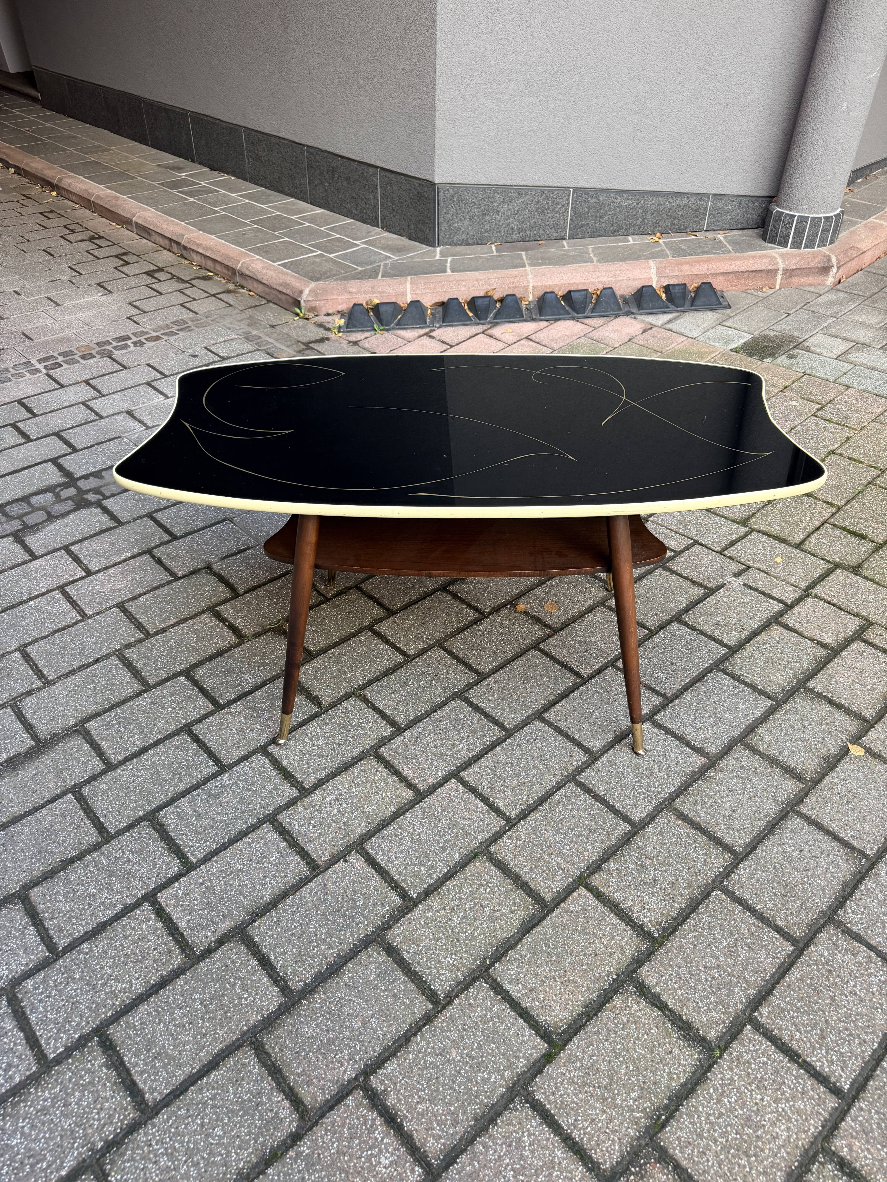 Black glass and wood coffee table