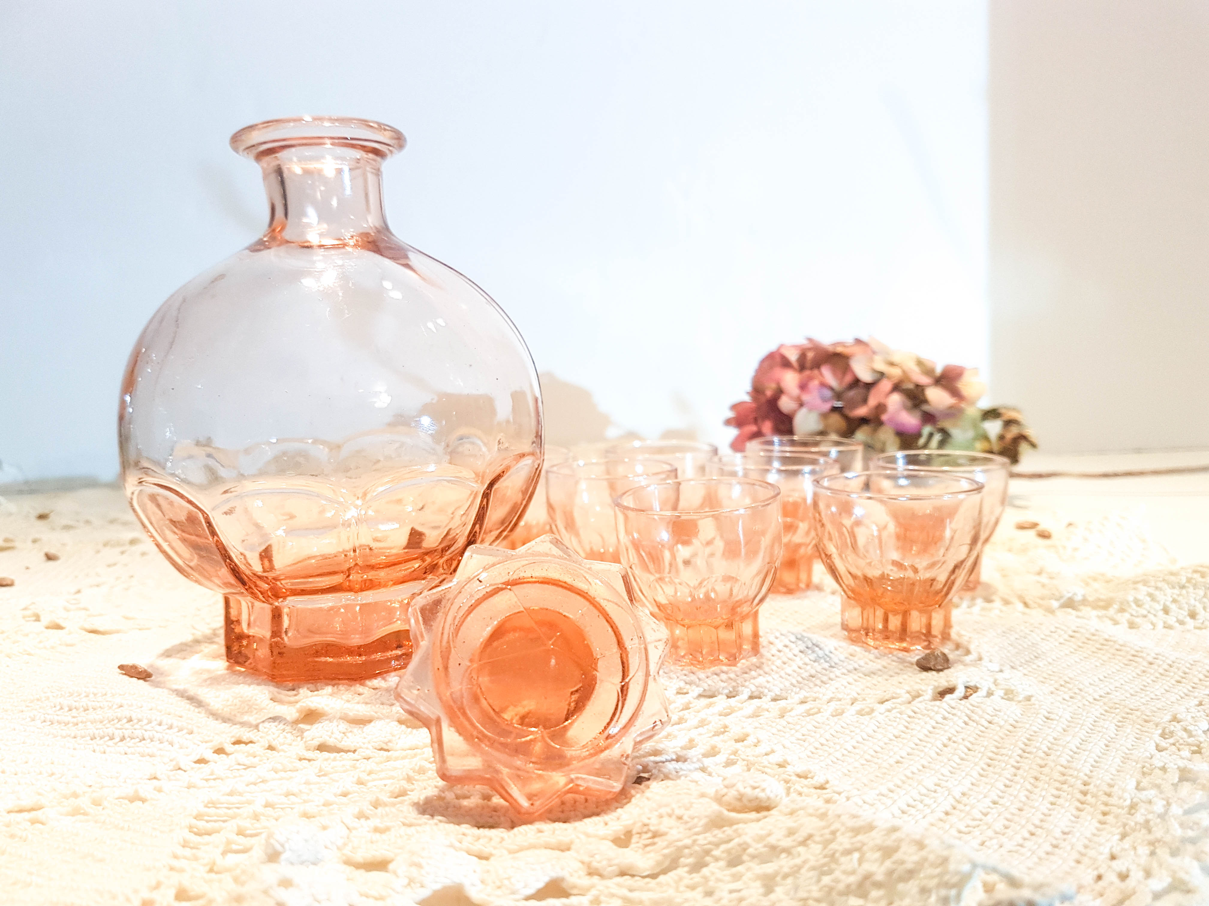 Art Deco-style pink liquor service