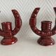2 fifties red ceramic candle holders, horseshoe pattern