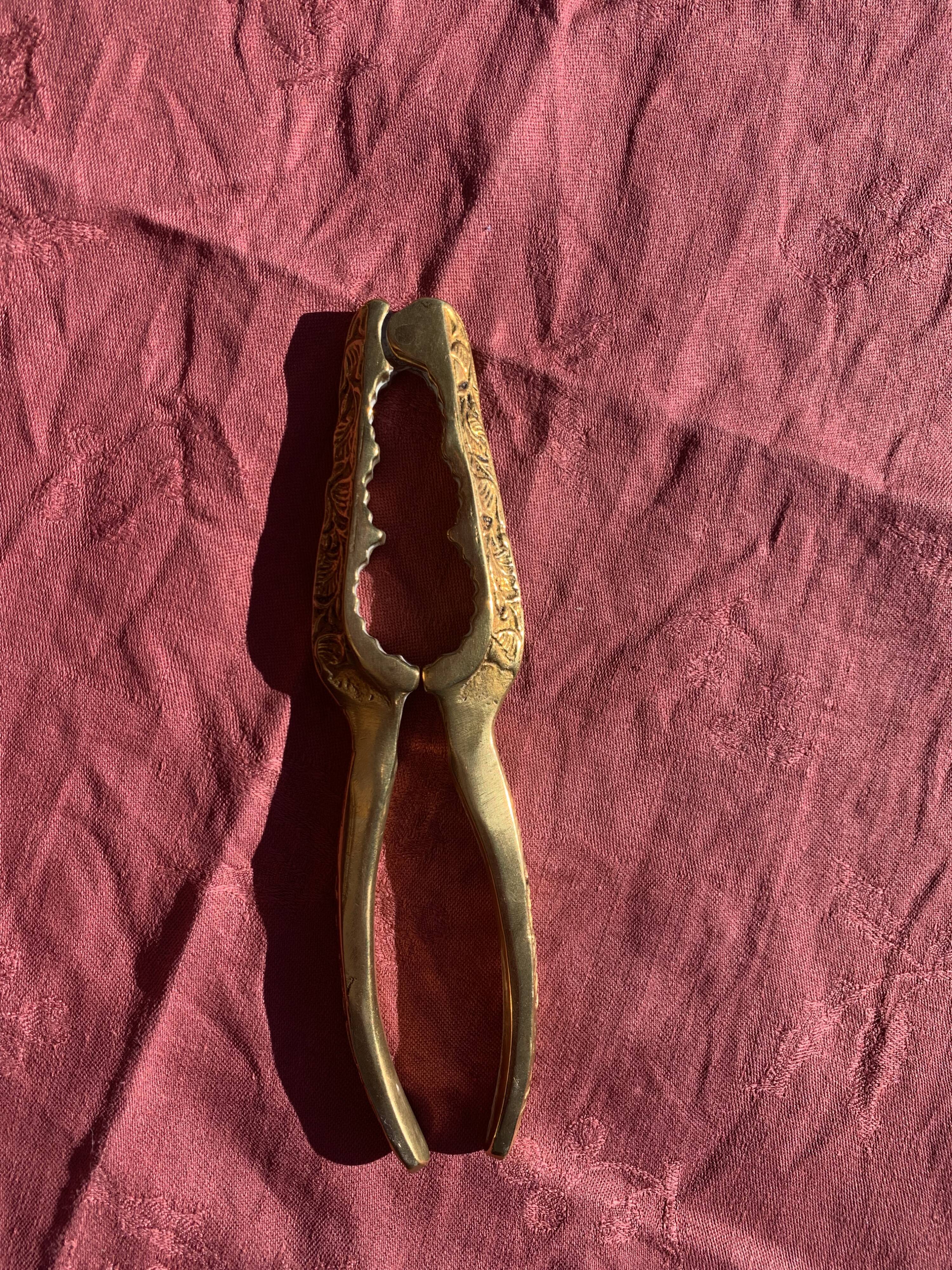 Nutcracker, vintage chiseled golden brass