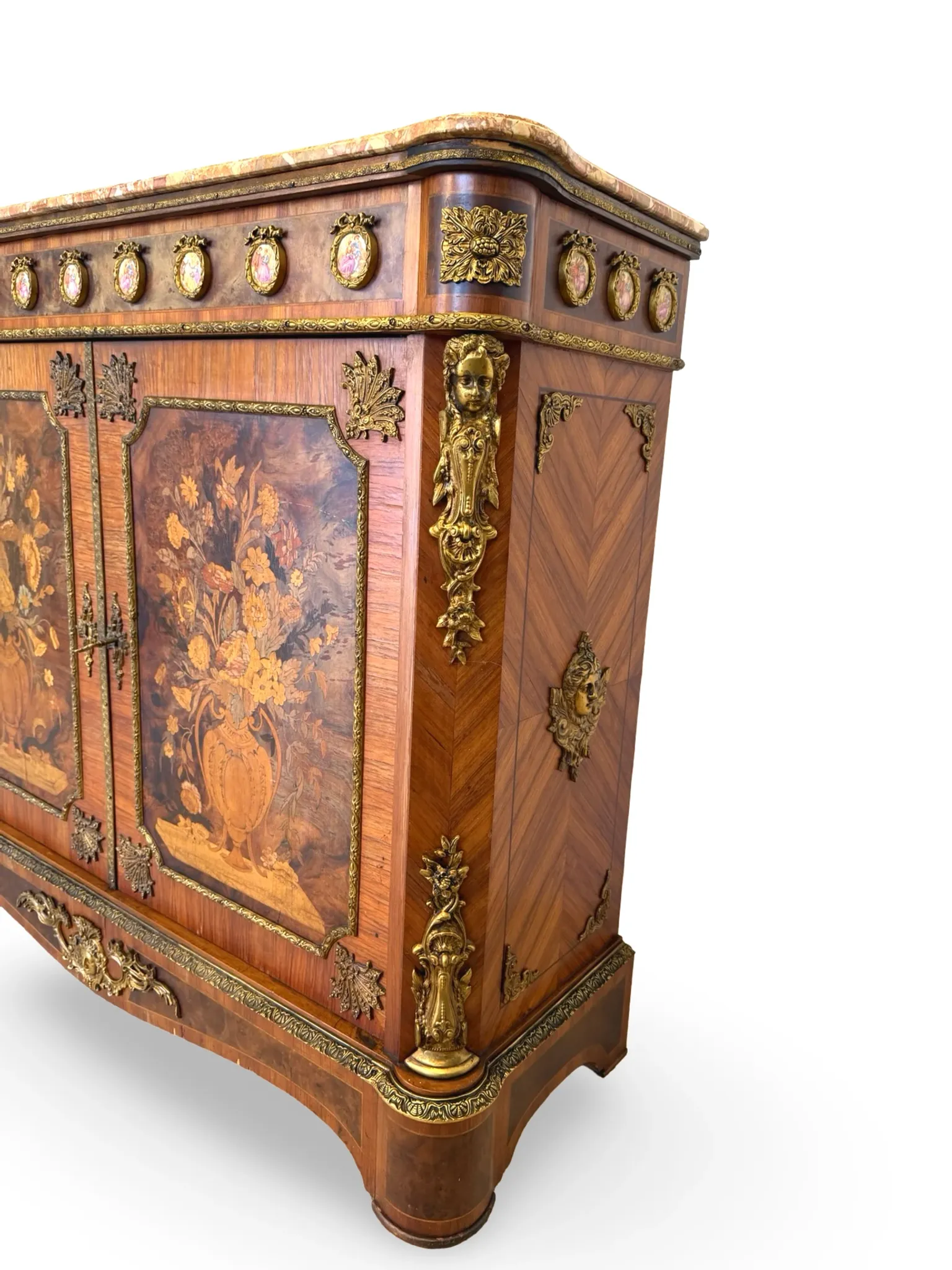 An antique French Louis XVI-style marble-top side cabinet