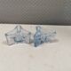 Two beautiful glass candle holders in translucent bluish glass.
