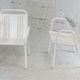 Pair of honeycomb steel armchairs. France, circa 1950.