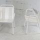 Pair of honeycomb steel armchairs. France, circa 1950.