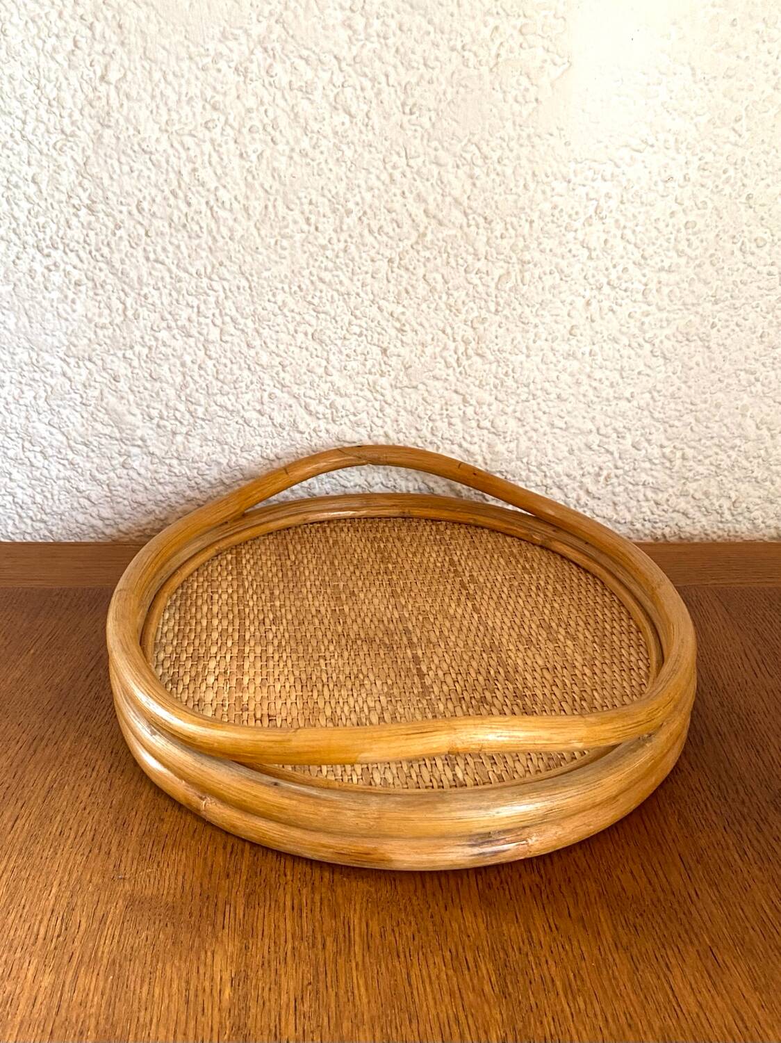 Oval tray made of rattan and bamboo from the 1970s
