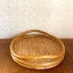 Oval tray made of rattan and bamboo from the 1970s