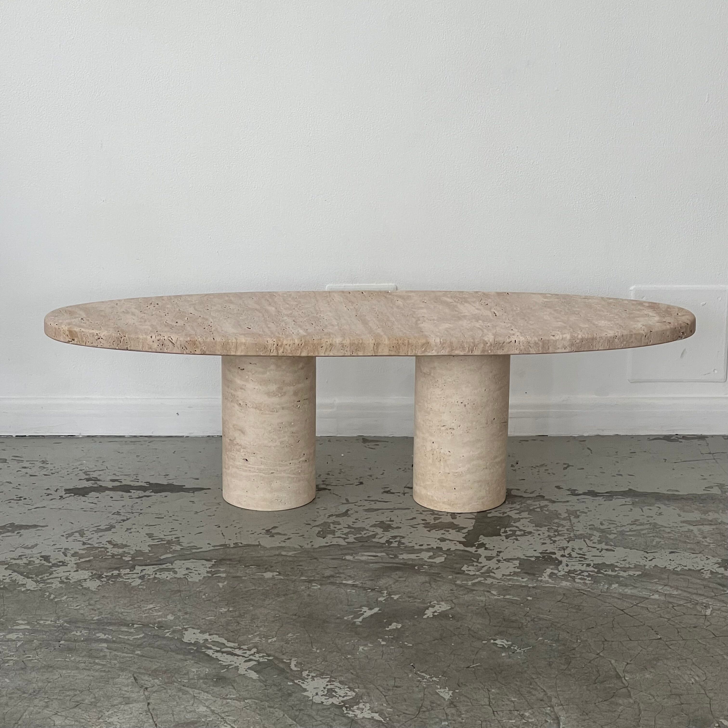 Oval travertine coffee table
