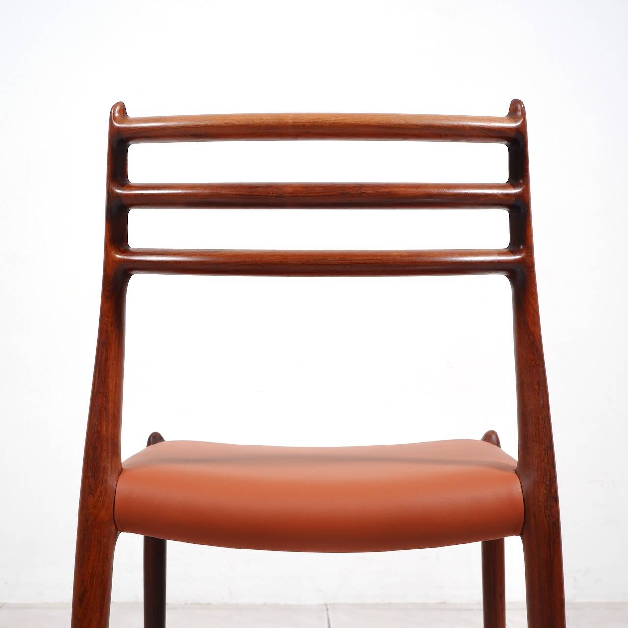 Set of 6 Niels Moller „Model 78“ rosewood dining chairs with cognac leather