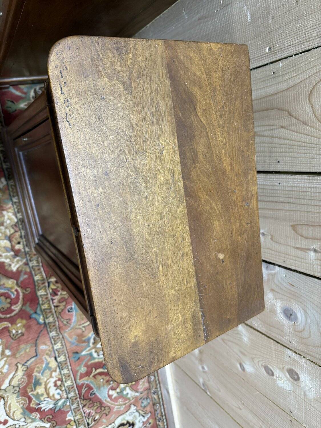 Pair of Louis Philippe style bedside tables in walnut