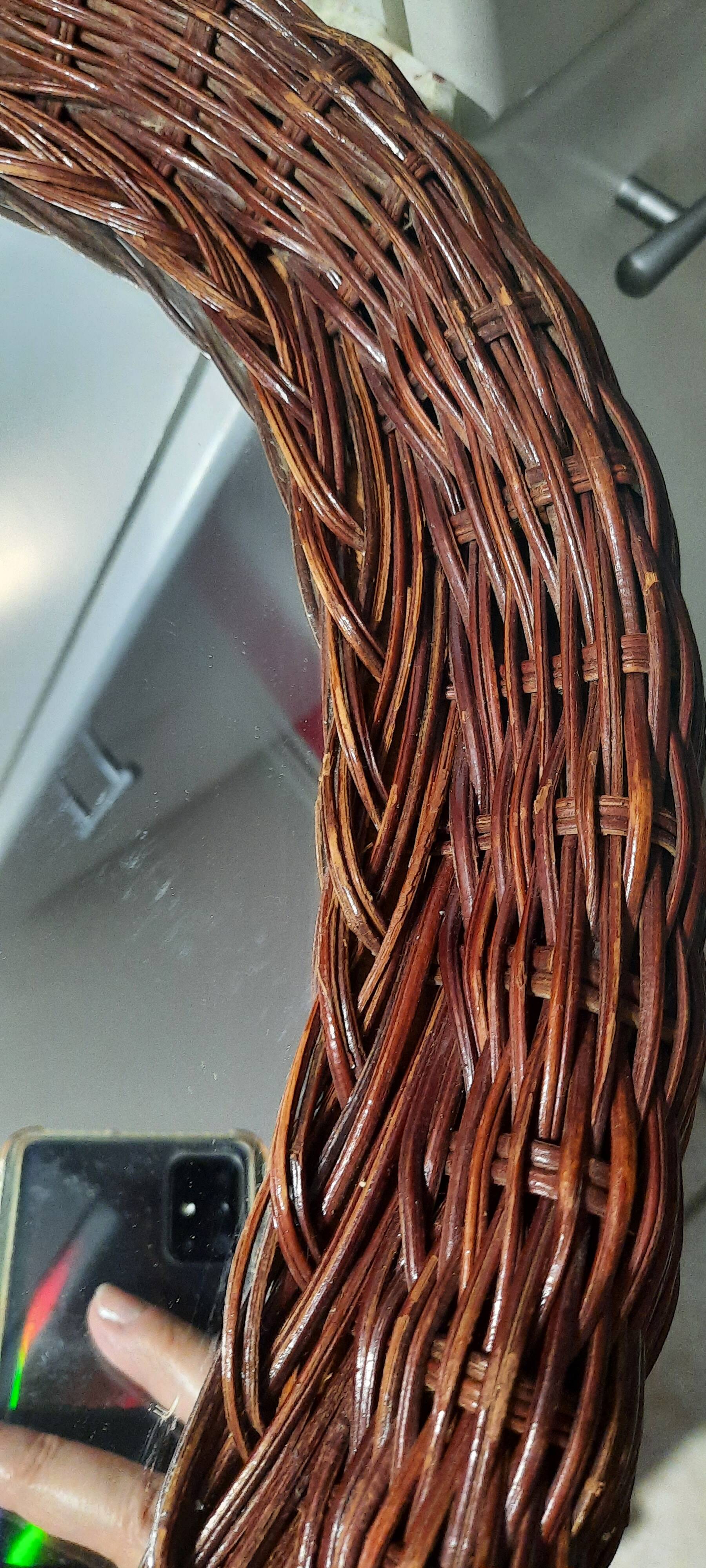 Vintage woven wicker oval mirror