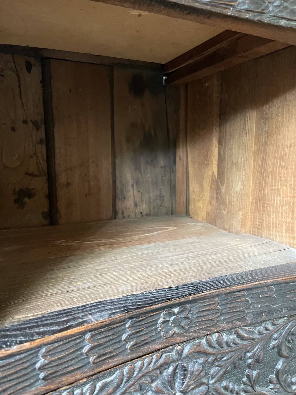 19th century chest of drawers in carved blackened pine