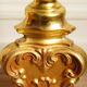 "Pique candle" double fire floor lamp in gilded bronze