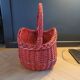 Red painted rattan basket