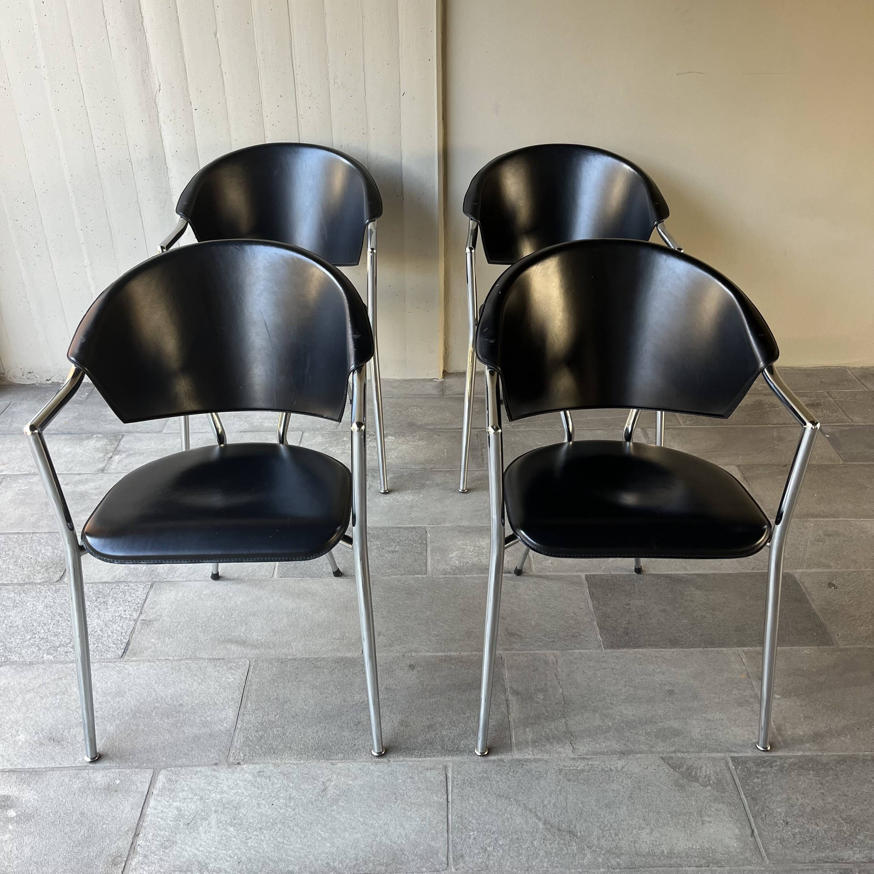 Set of four Italian black leather chairs, 1970