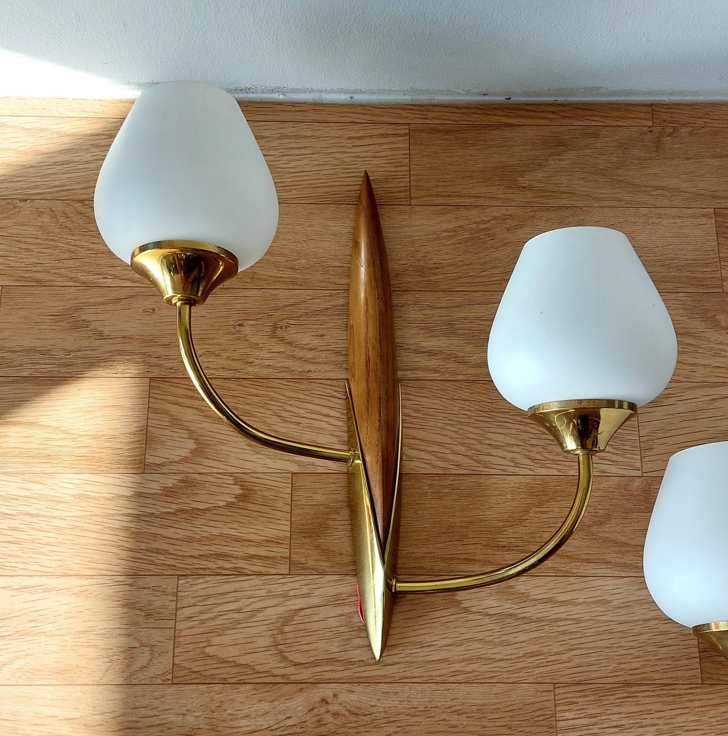 Pair of wood and gilded brass sconces 1950 boat hulls with 2 lights.