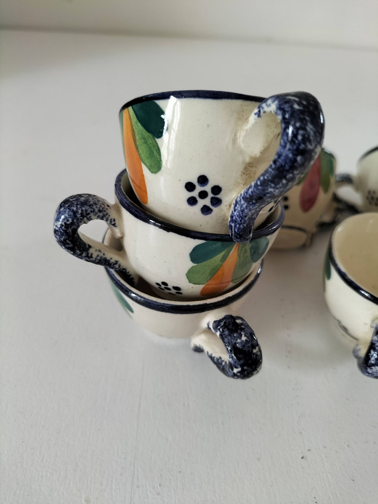 Set of 7 miniature Quimper earthenware cups