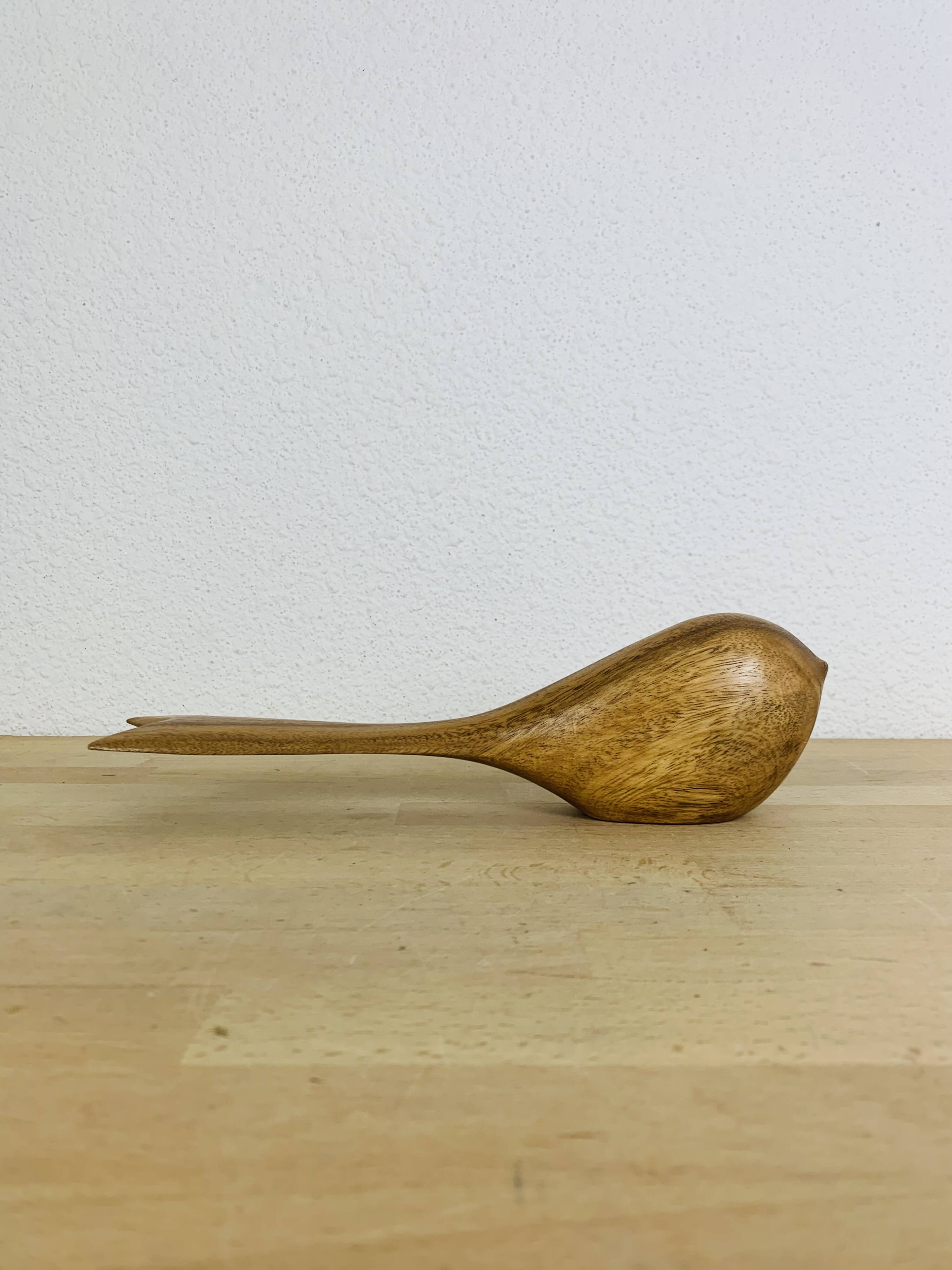 Vintage wooden bird sculpture