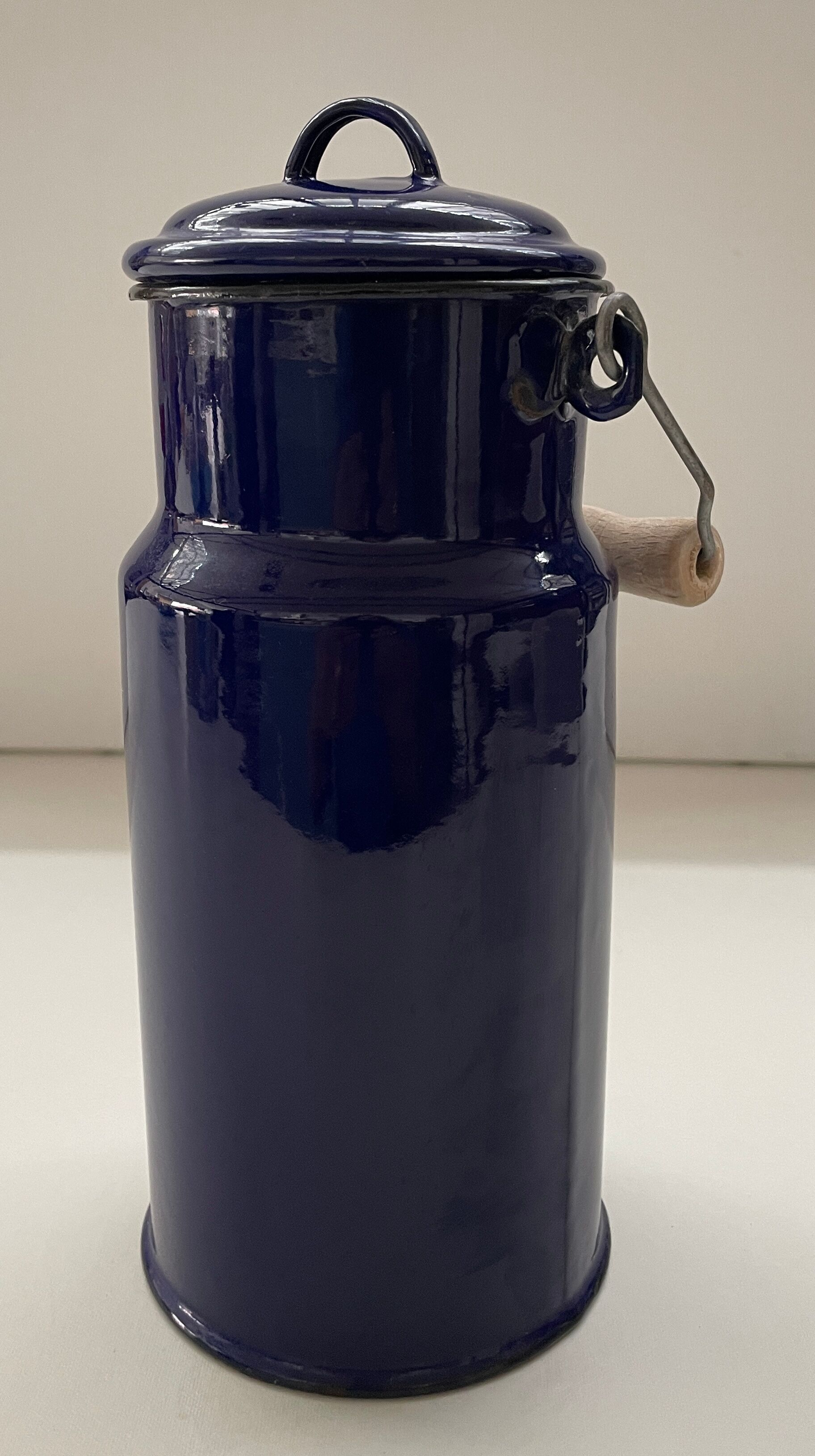 Blue enamelled milk jug