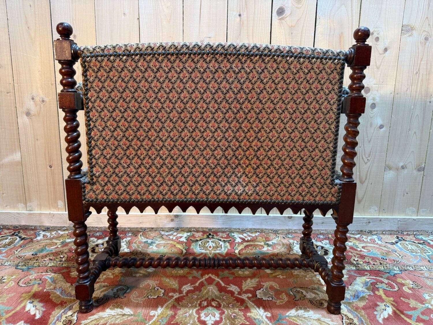 Small office bench in mahogany in the Louis XIII style.