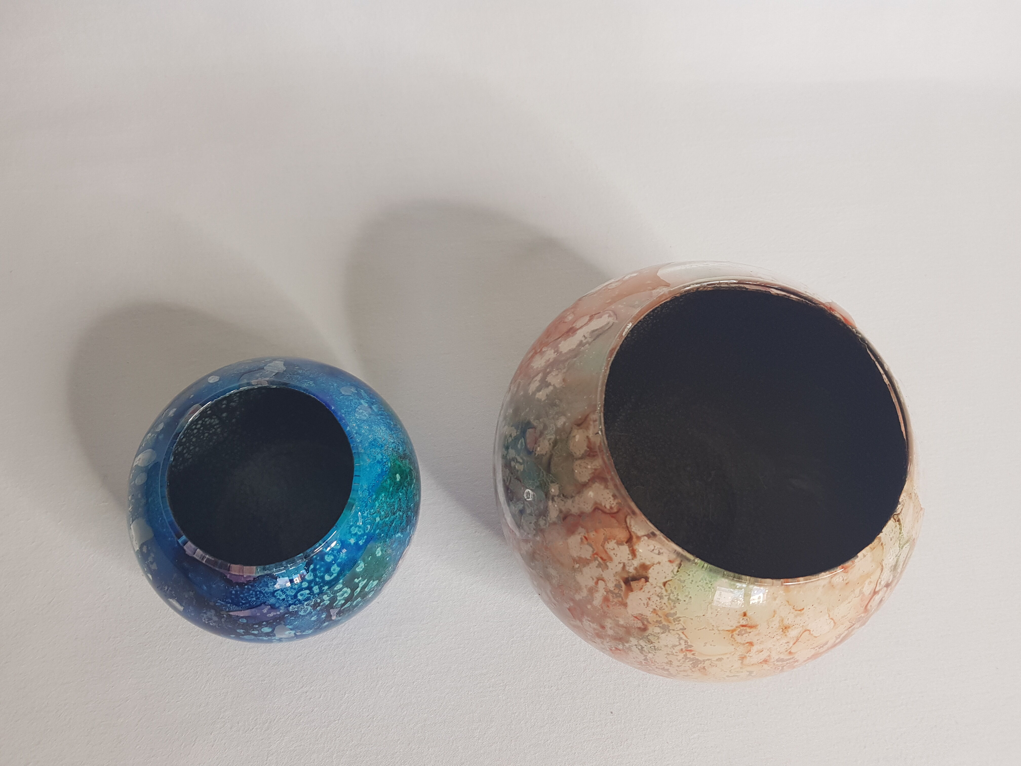 Set of two hand lacquered glass ball vases signed "Laque Line" and "Jean-Noel Bouillet"