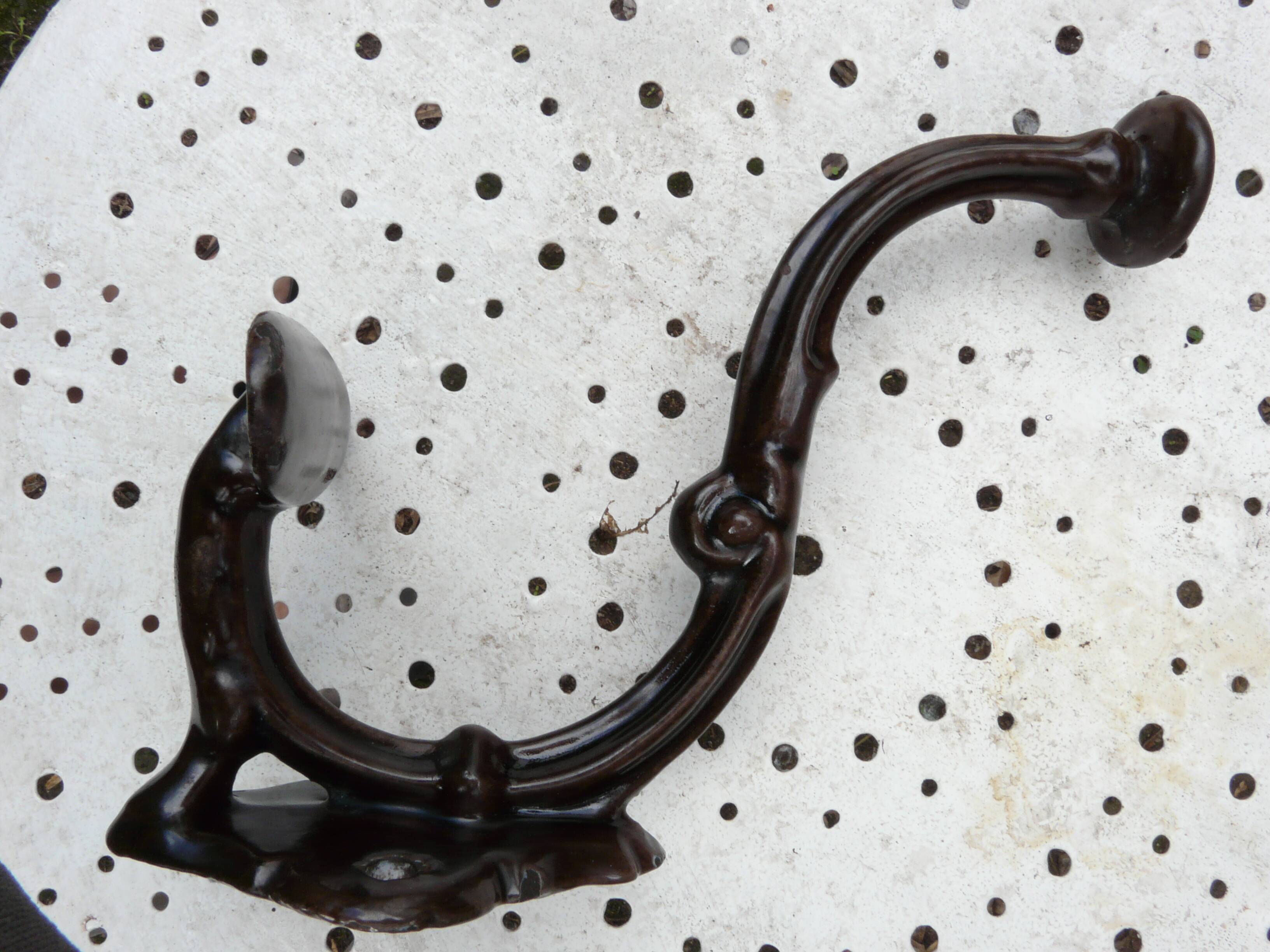 Art Nouveau period coat rack, 1910, in enamelled cast iron, brown