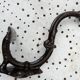 Art Nouveau period coat rack, 1910, in enamelled cast iron, brown
