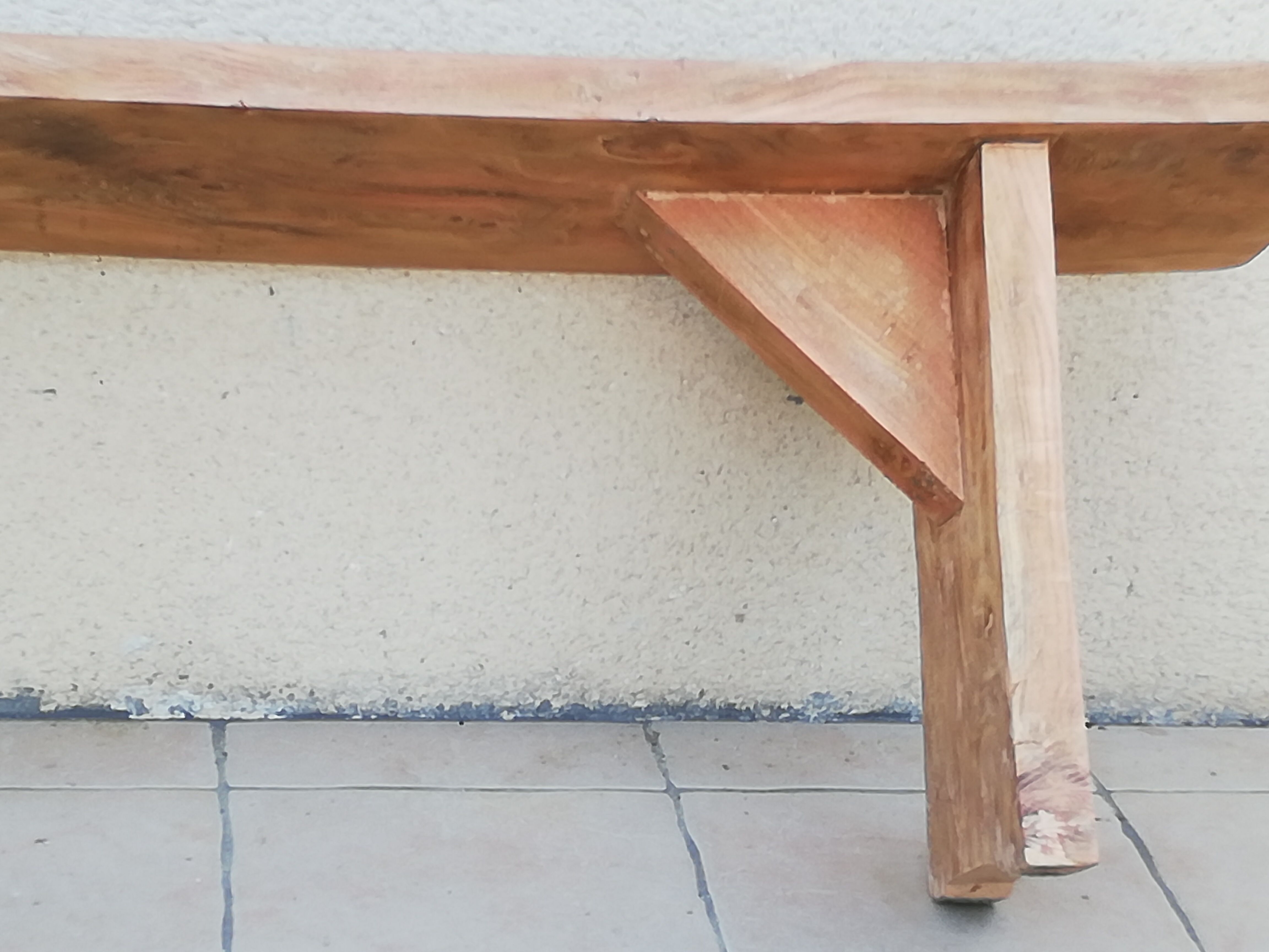 Old country bench in solid wood