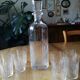 Carafe and its 8 assorted Baccarat crystal glasses