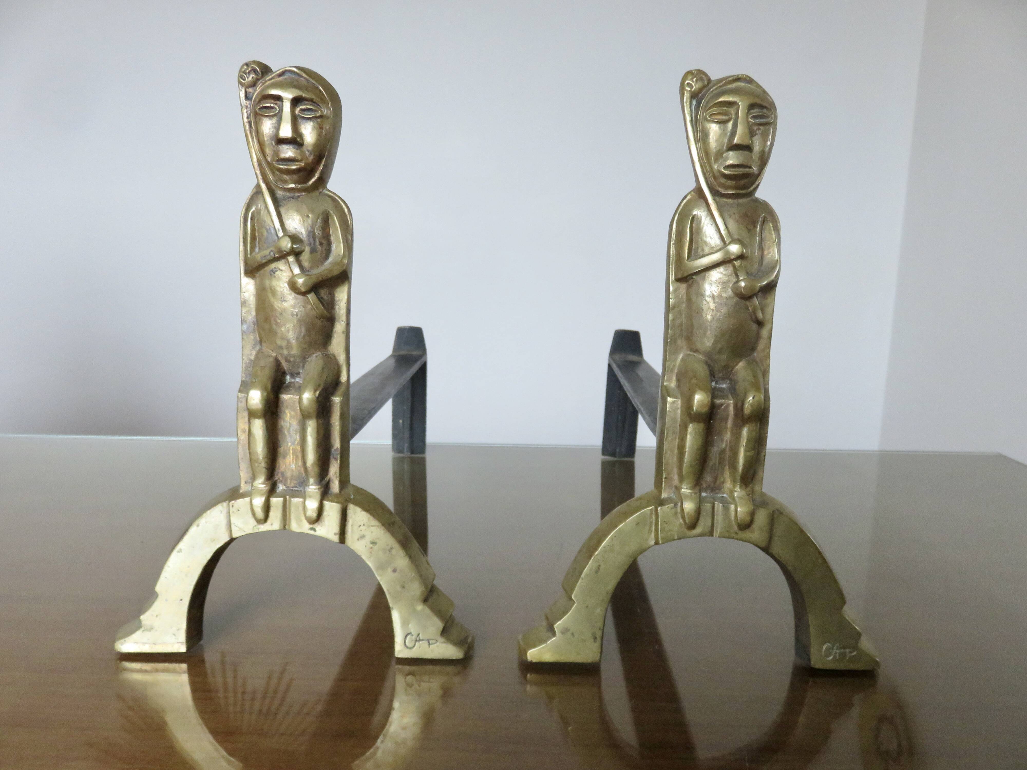 Anton Prinner, pair of Shaman fire dogs in gilded bronze, monogrammed, 1930