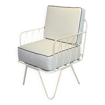 Armchair designed by Raoul Guys