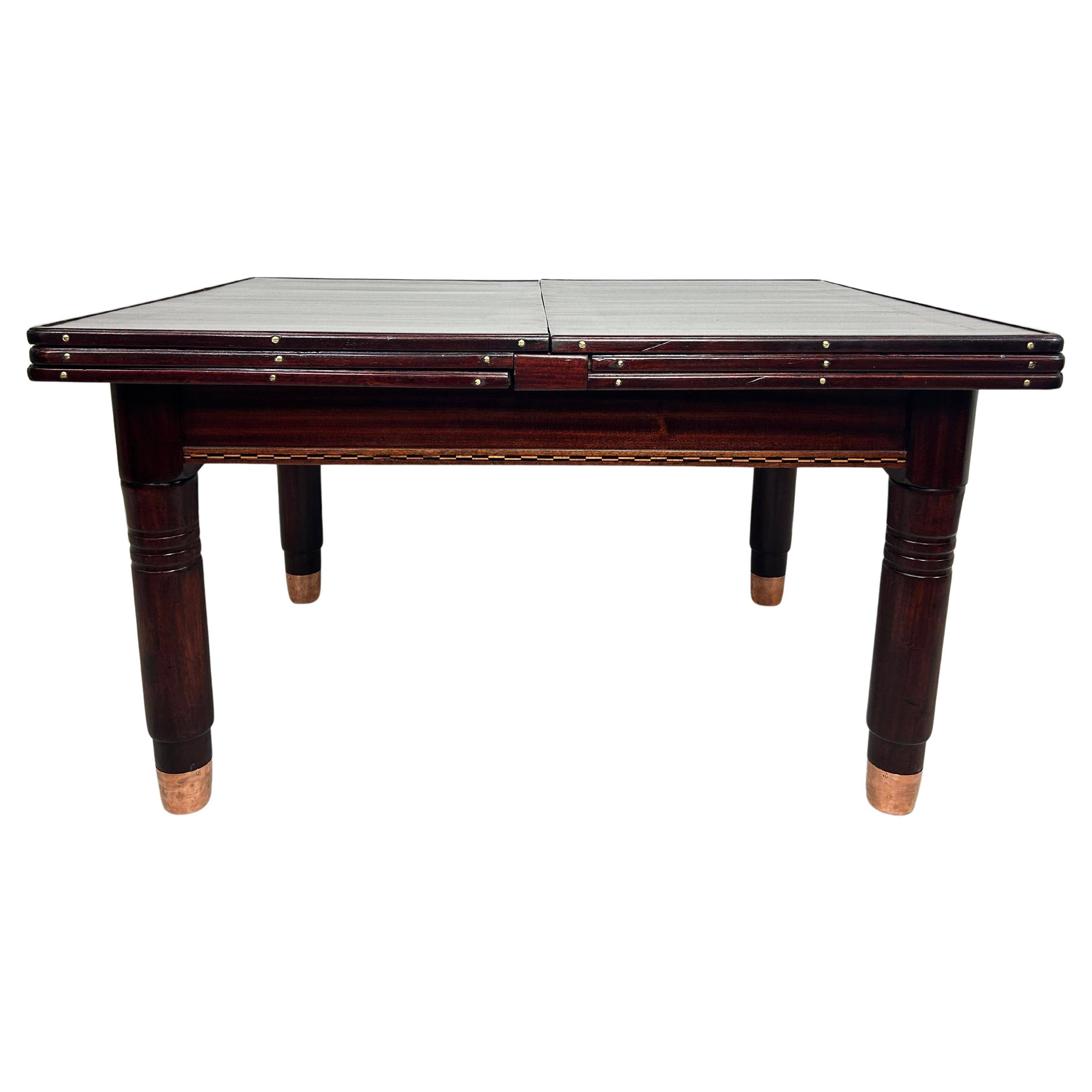 Large dining table in the Secession style by Karoly Lingel, Budapest.