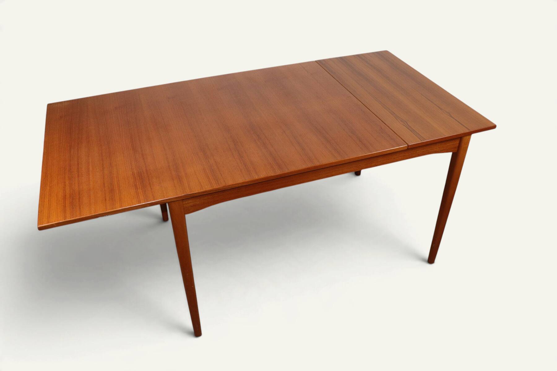 Rectangular extendable dining table in Scandinavian teak – 1960s
