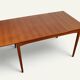 Rectangular extendable dining table in Scandinavian teak – 1960s