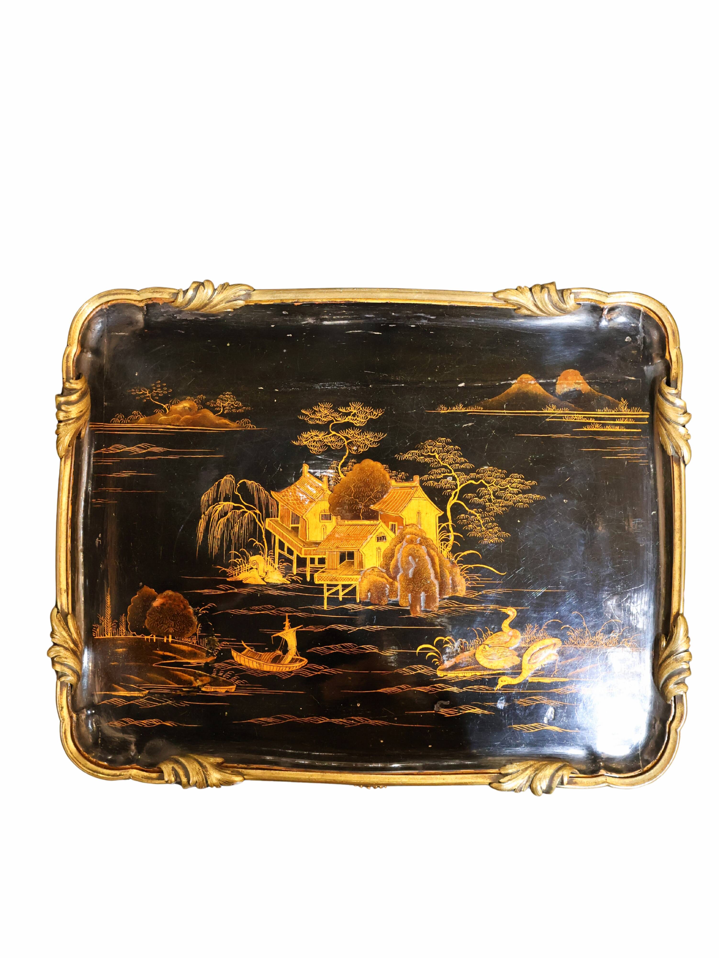 Japanese-style work table from the Napoléon III period in black lacquer and gilded bronze.