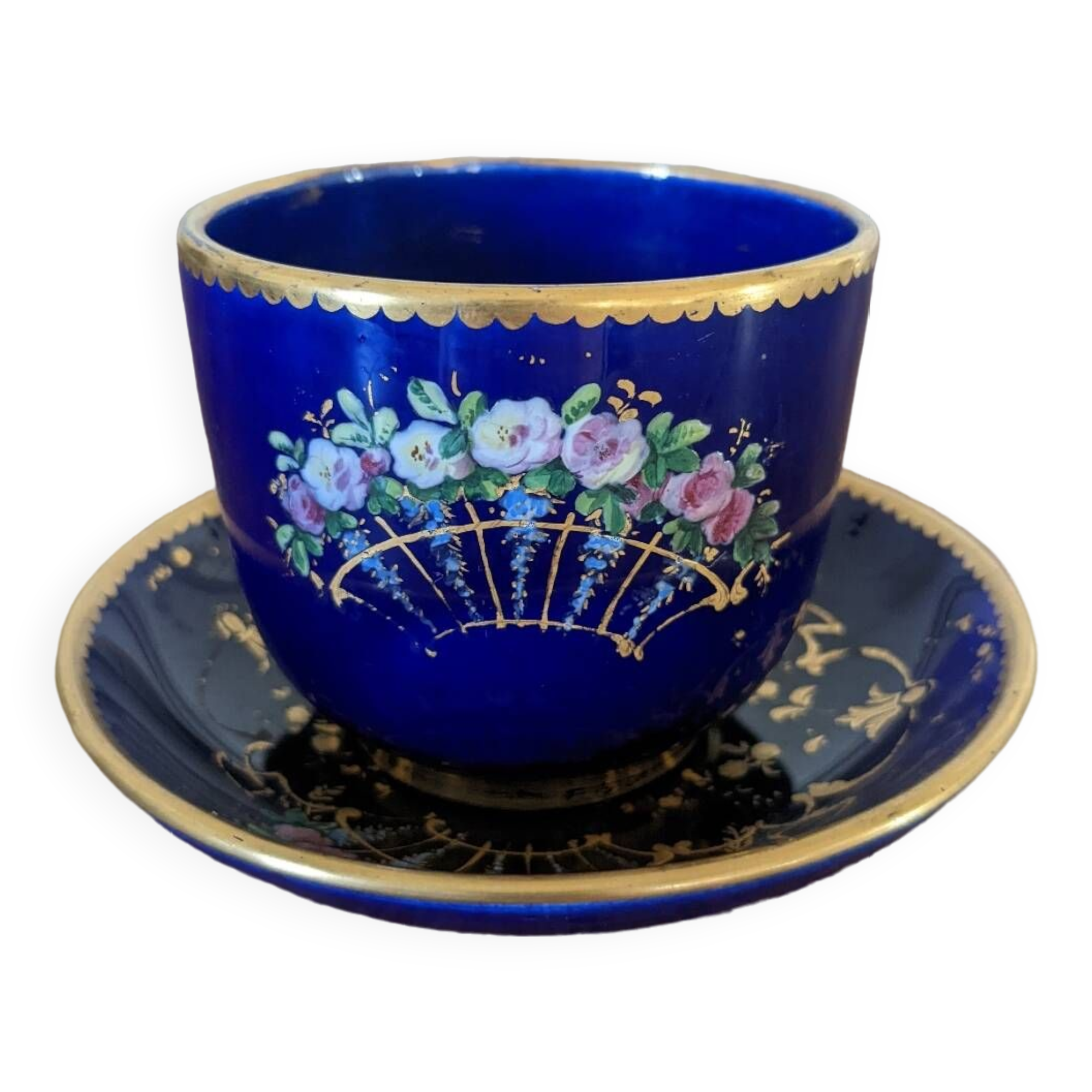 Earthenware cup and saucer