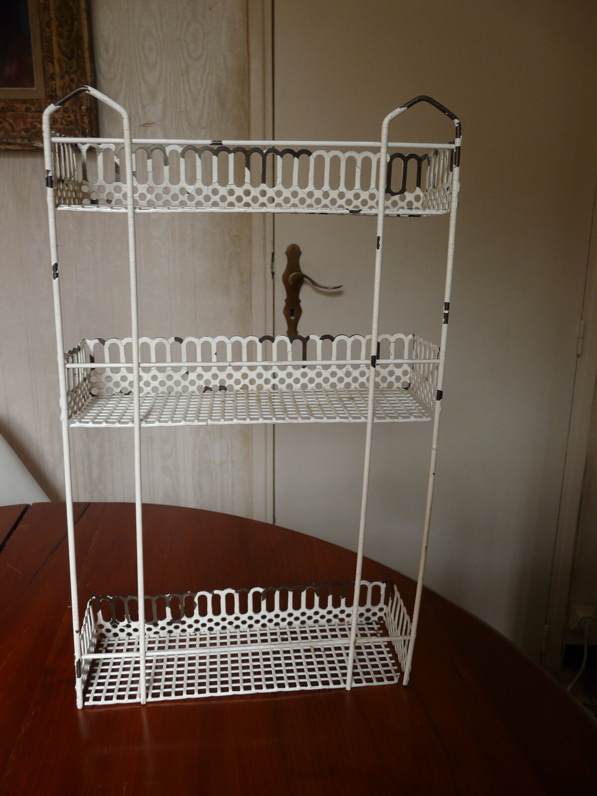 Perforated metal shelf