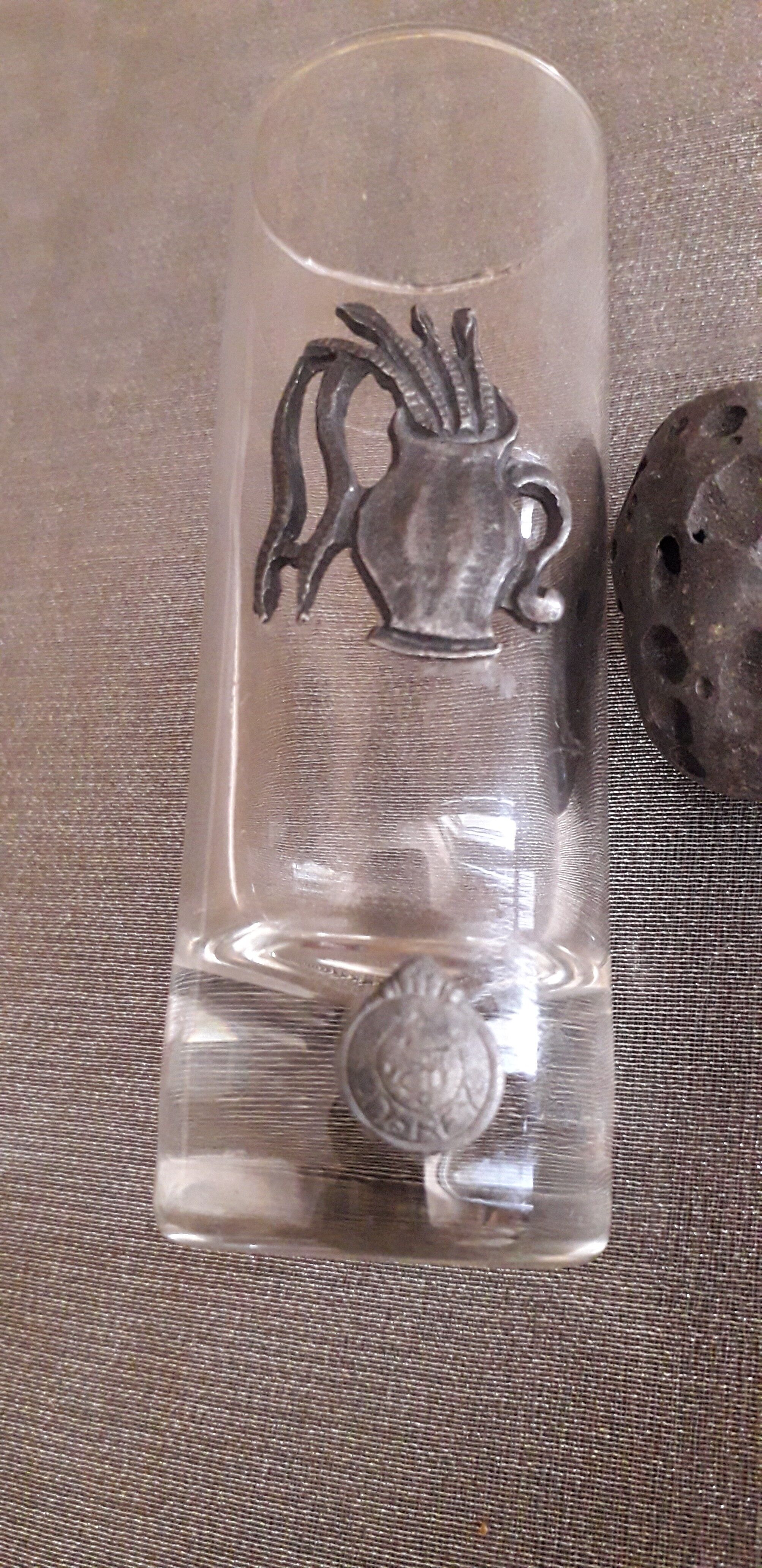 Glass liquor glass with tin sconces signed J.de Rey