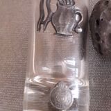 Glass liquor glass with tin sconces signed J.de Rey